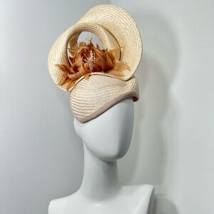 Elegant Cream Fascinator with Floral Accent